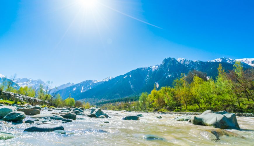 Beautiful River and snow covered mountains landscape Kashmir state, India