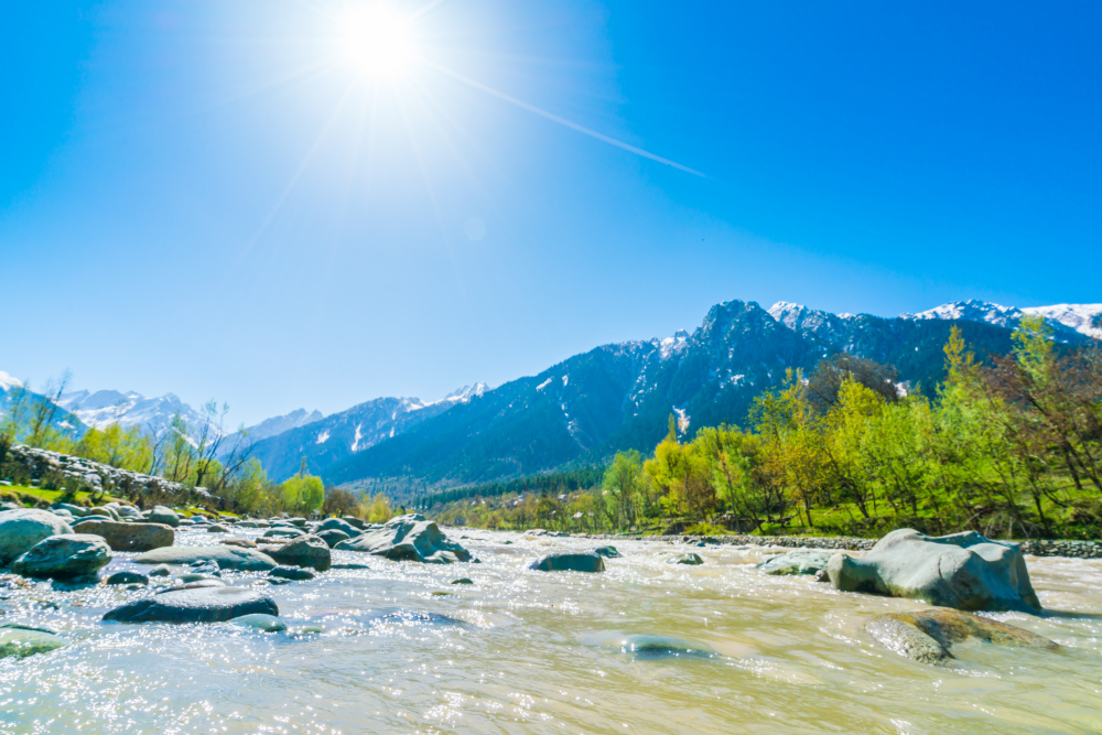 Beautiful River and snow covered mountains landscape Kashmir state, India